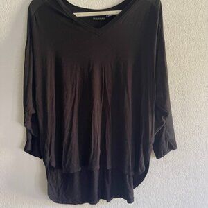 Black 3/4 sleeve, with shear material in arms.